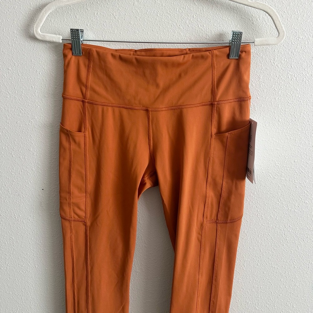 Athleta High-Rise Pocket Leggings in Burnt Orange - Picture 6 of 11
